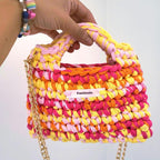 Sac au crochet aux couleurs du coucher du soleil fuschia, orange, jaune et rose poudré, fait main à Marseille
